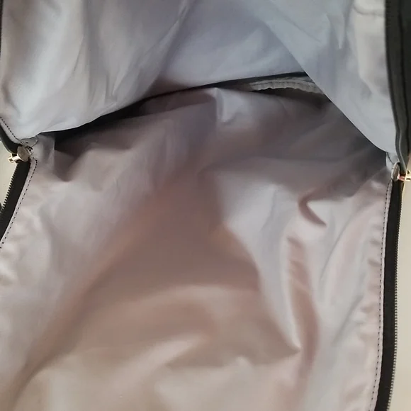 NWT Tumi Just in Case Backpack in Black and Gold